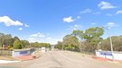 A police student has been charged after crashing into a boom gate at the NSW Police Force Academy while allegedly drunk.